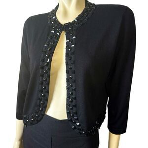 Luxxe Lane NWOT Black Shrug with Large Black Embellishments Size Large